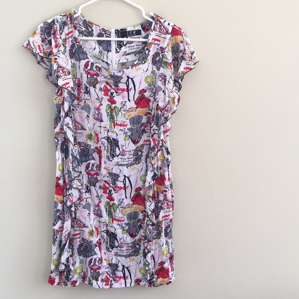 Cotton used dress filled with art features